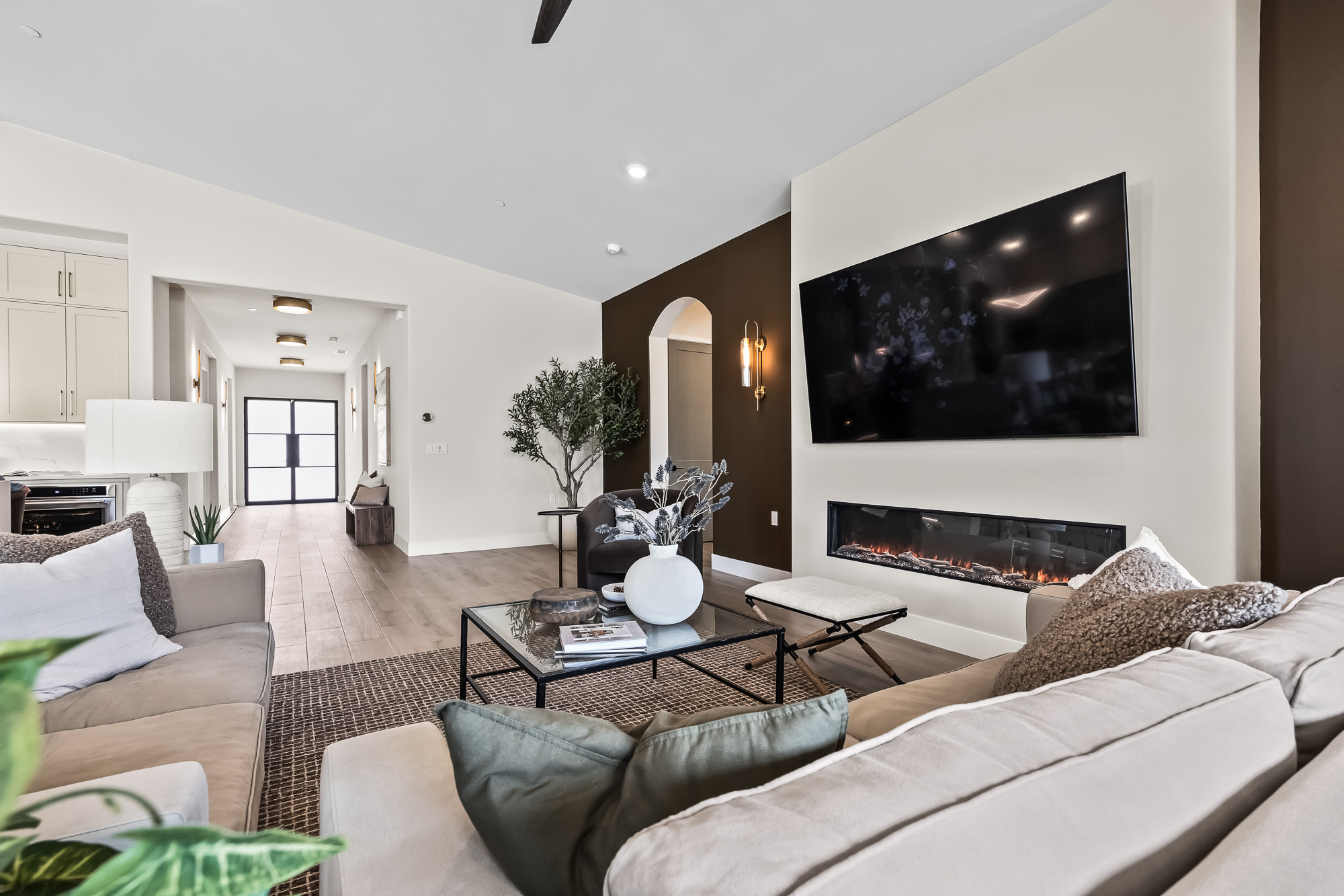 Wide angle of great room and entry hallway