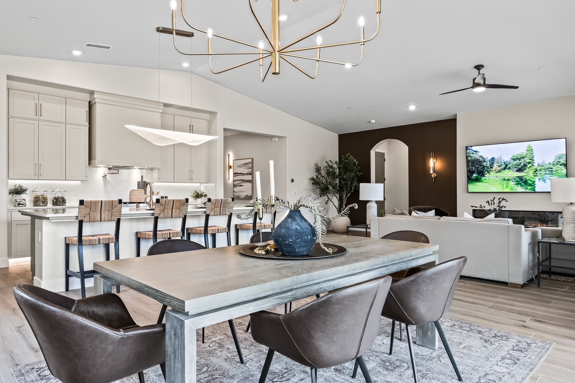 wide angle of dining area, kitchen, and great room