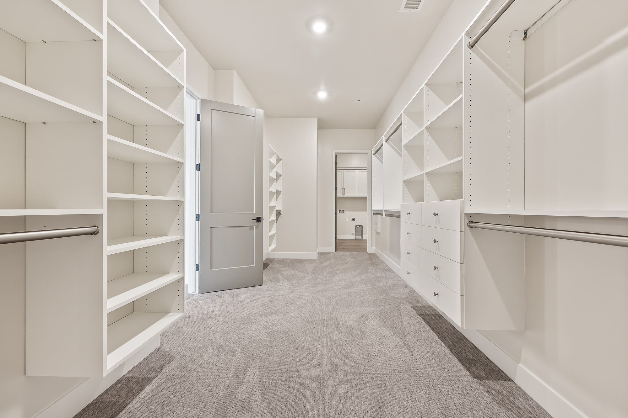 wide angle of owner's wardrobe