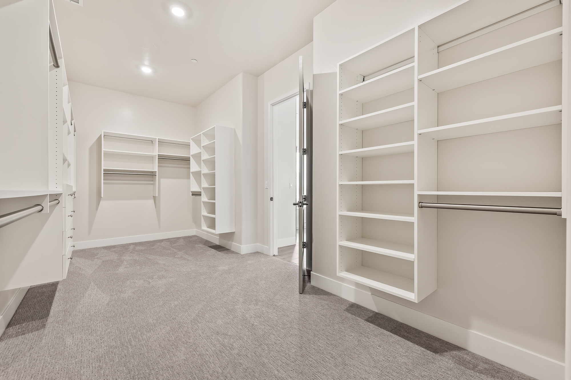 wide angle of owner's wardrobe
