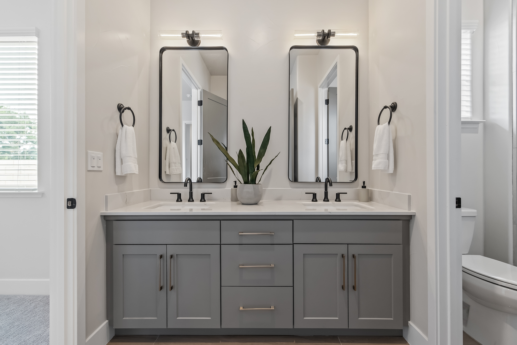 wide angle of bathroom 4 with dual vanity