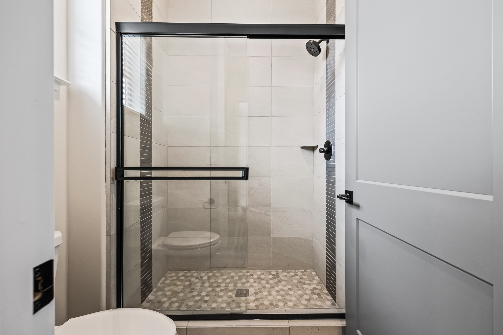 close up angle of bathroom 4 with toilet and shower