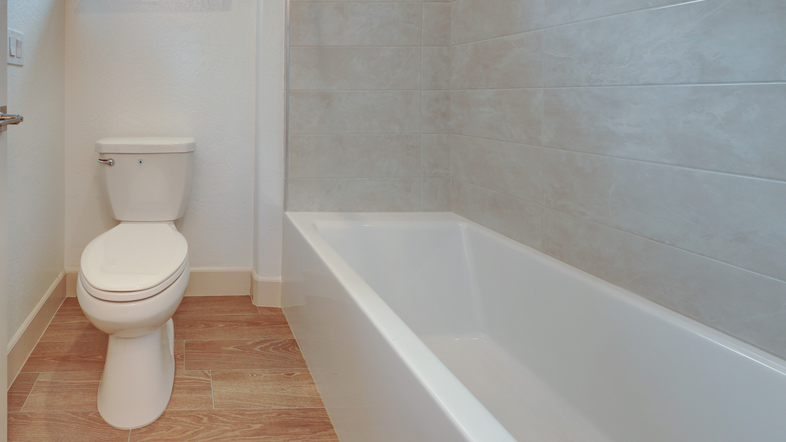Bathroom with separate tub and toilet room.