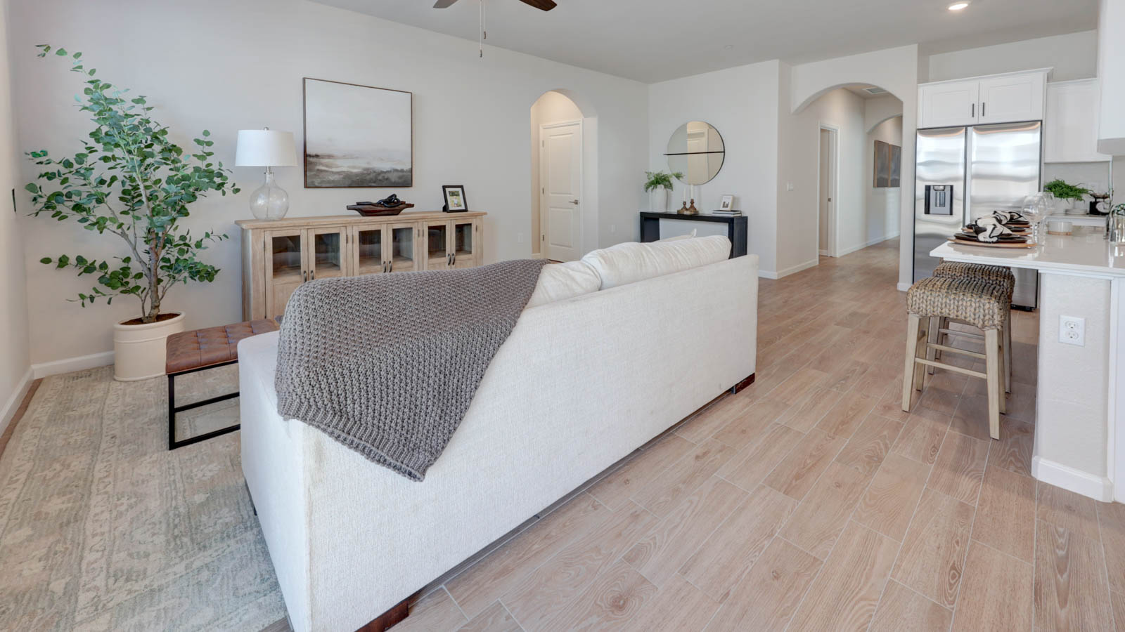 Great Room with tile flooring and three windows