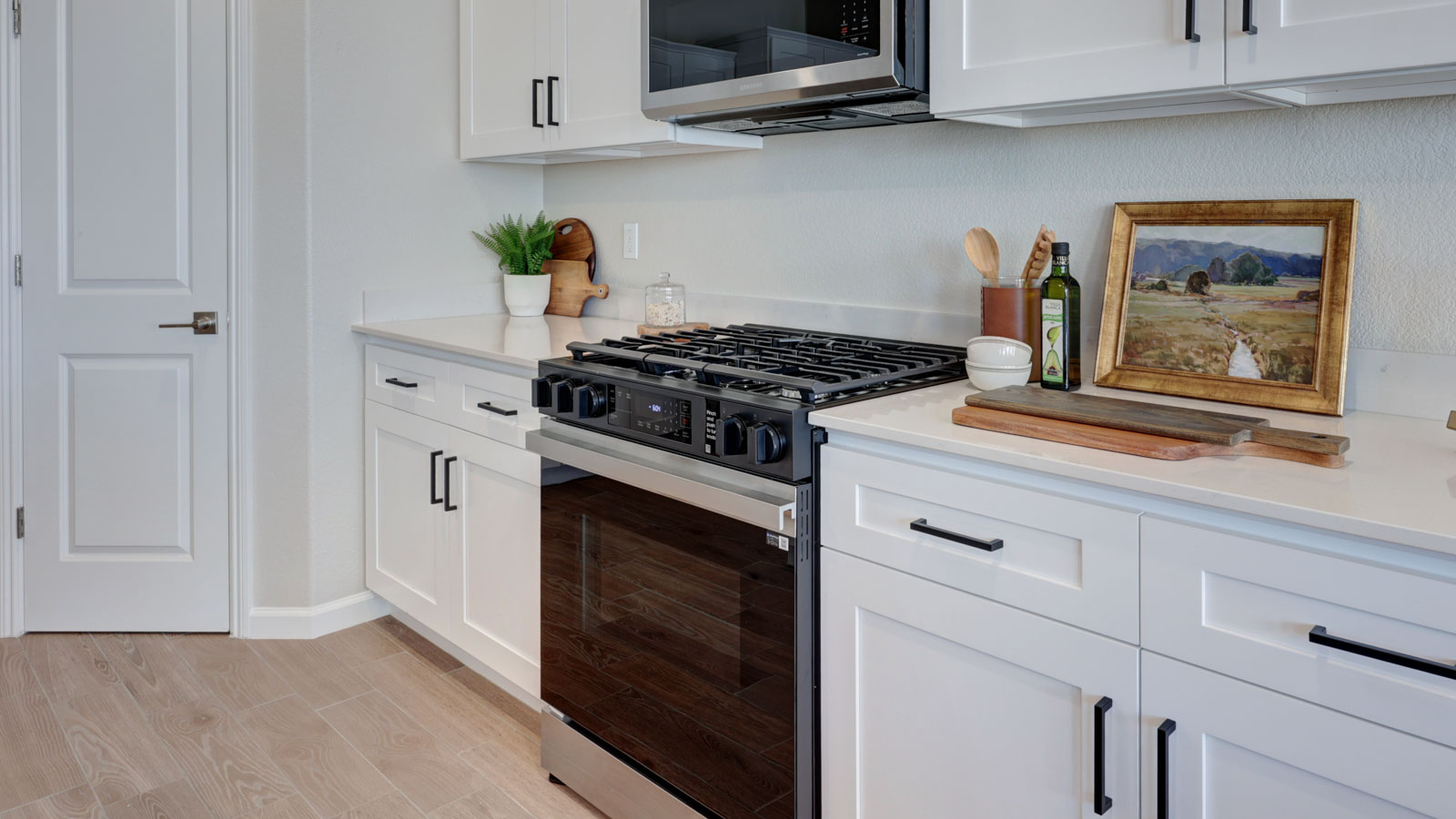Kitchen with Samsung Stove and Microwave