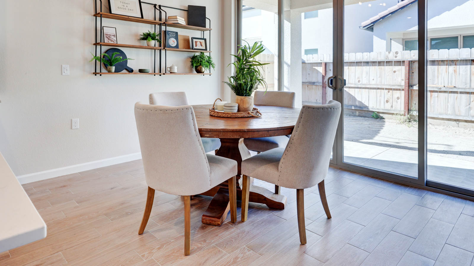 Dining nook with 9' slider and tile flooring