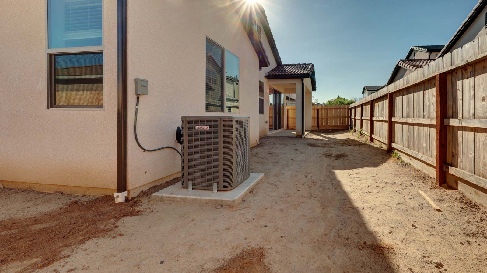 Un-landscaped rear yard