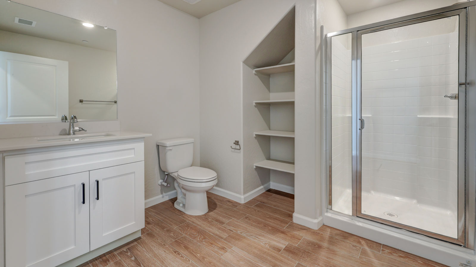 Bathroom 3 with tile floor and open shelving