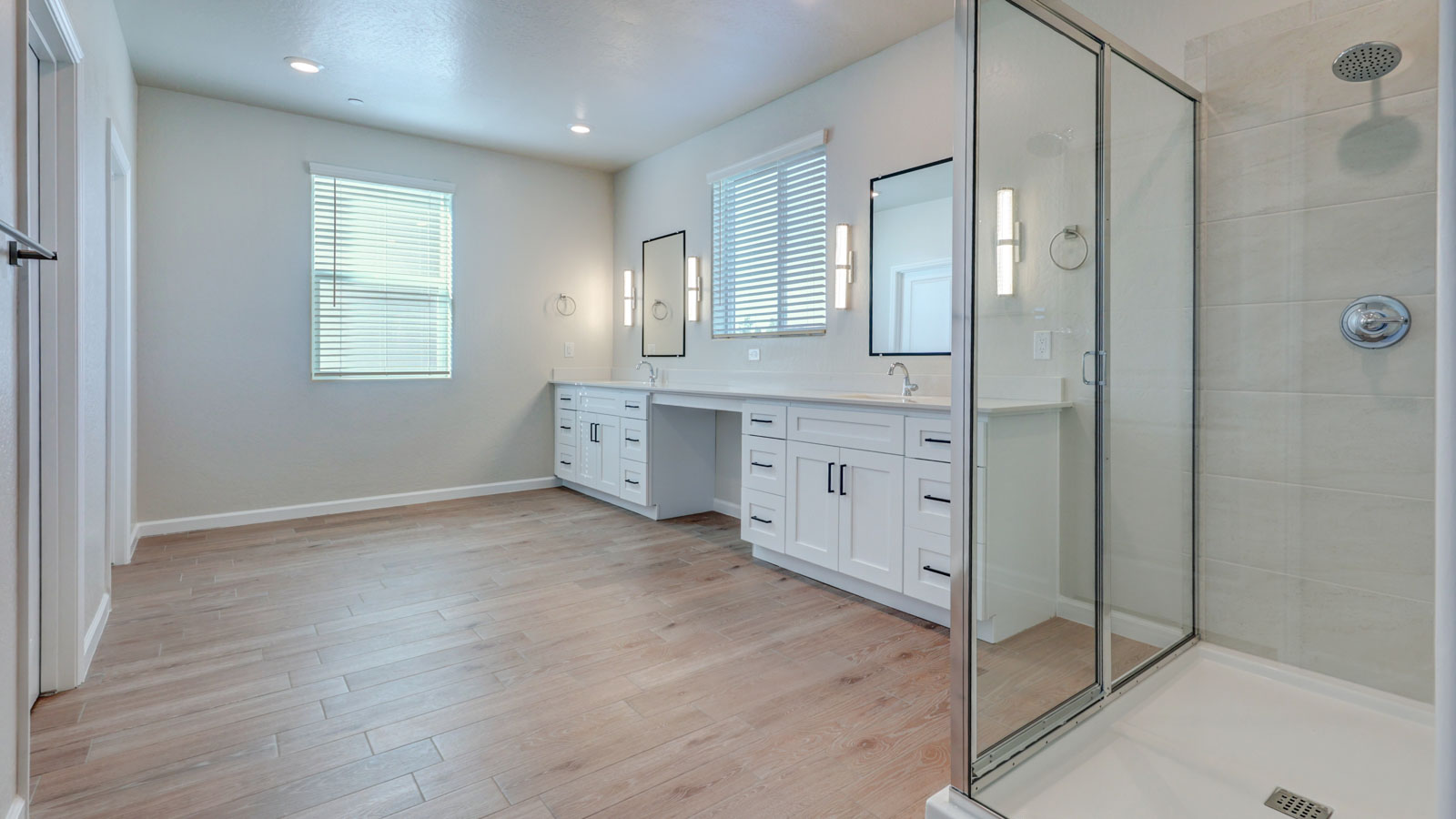 Spacious bath with large shower and adjoining two walk-in closets