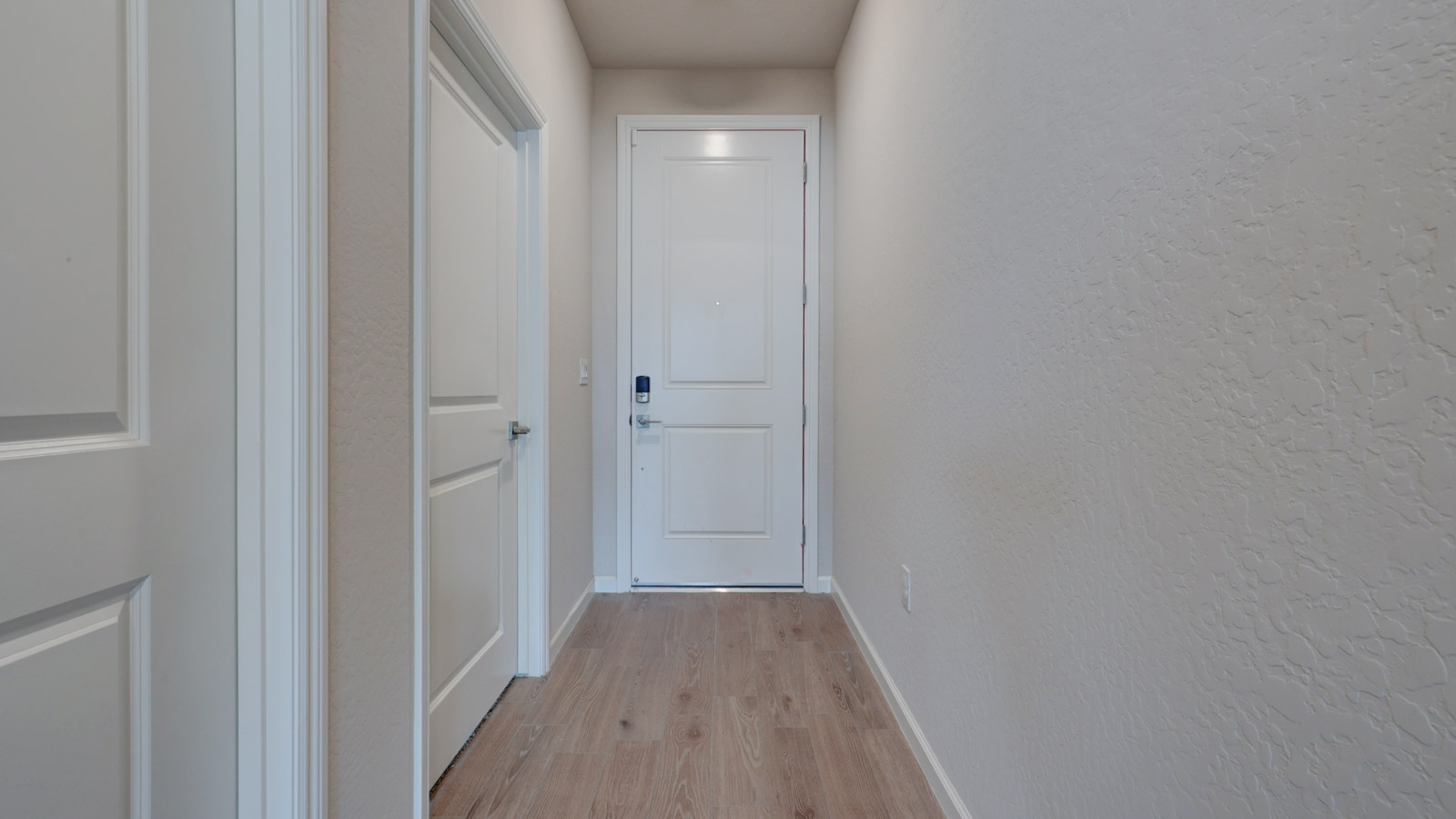 Entry with 8' door and tile flooring