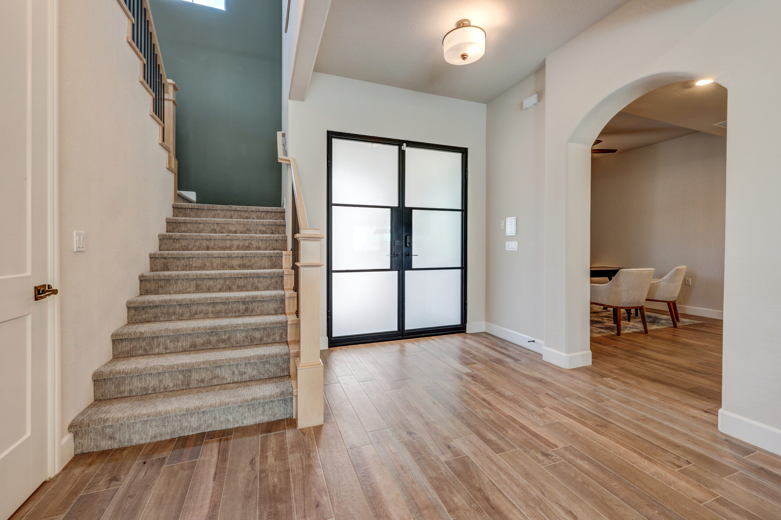 Entry with staircase and office