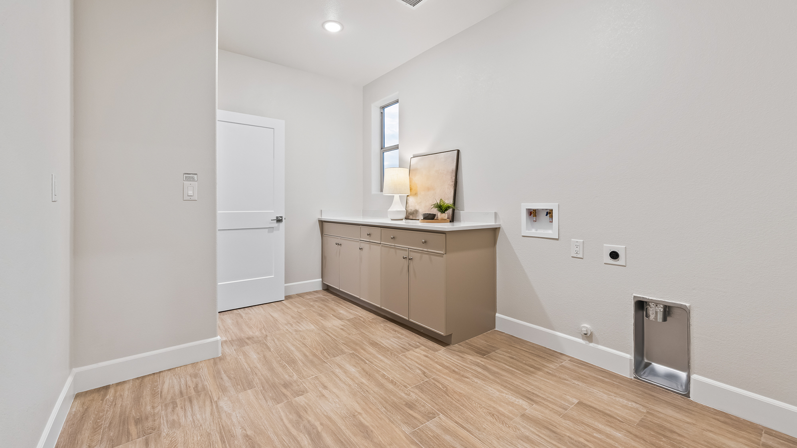 Wide angle of laundry room